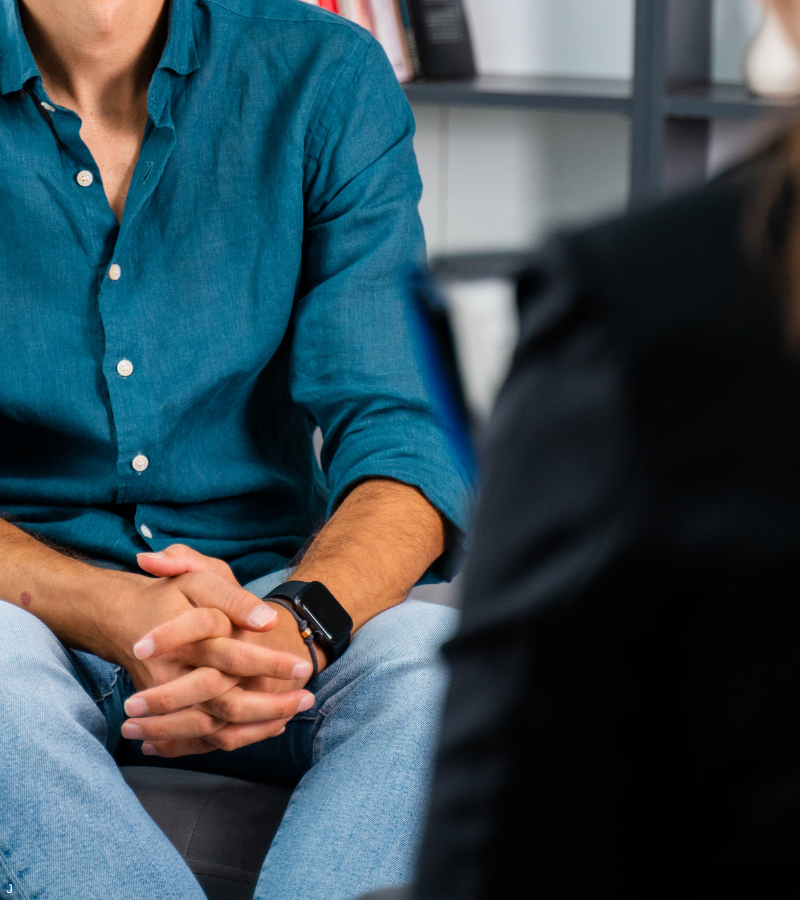 Man sitting down in therapy